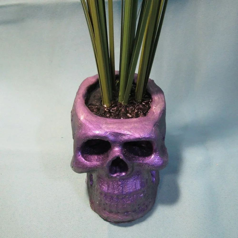 Aquarium Decoration - Purple Zombie Skull with Tall Green Plant.